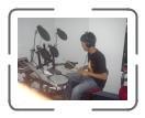 Playing with electric drum at Music Land
 : Sujin.com.np